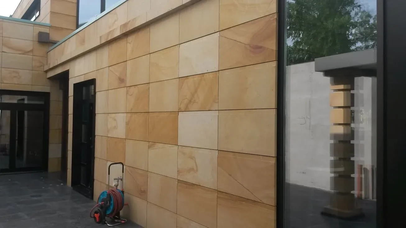 Façade cladding – Atlas Dachdecker