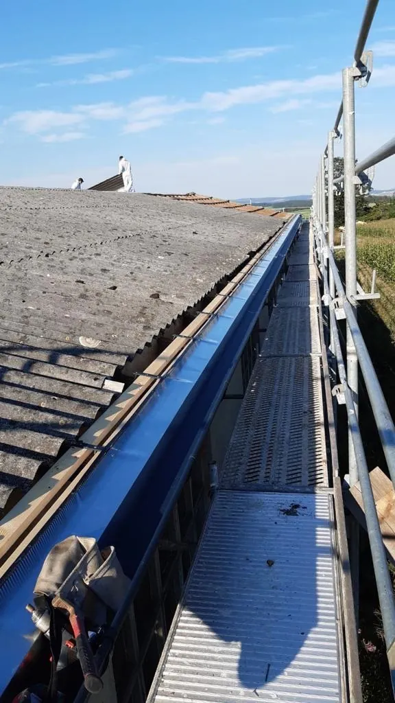 Scaffolding and fall protection at an asbestos roof