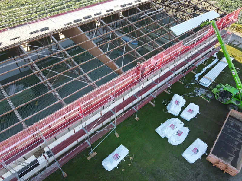 Asbestos removal on a hall with big bags