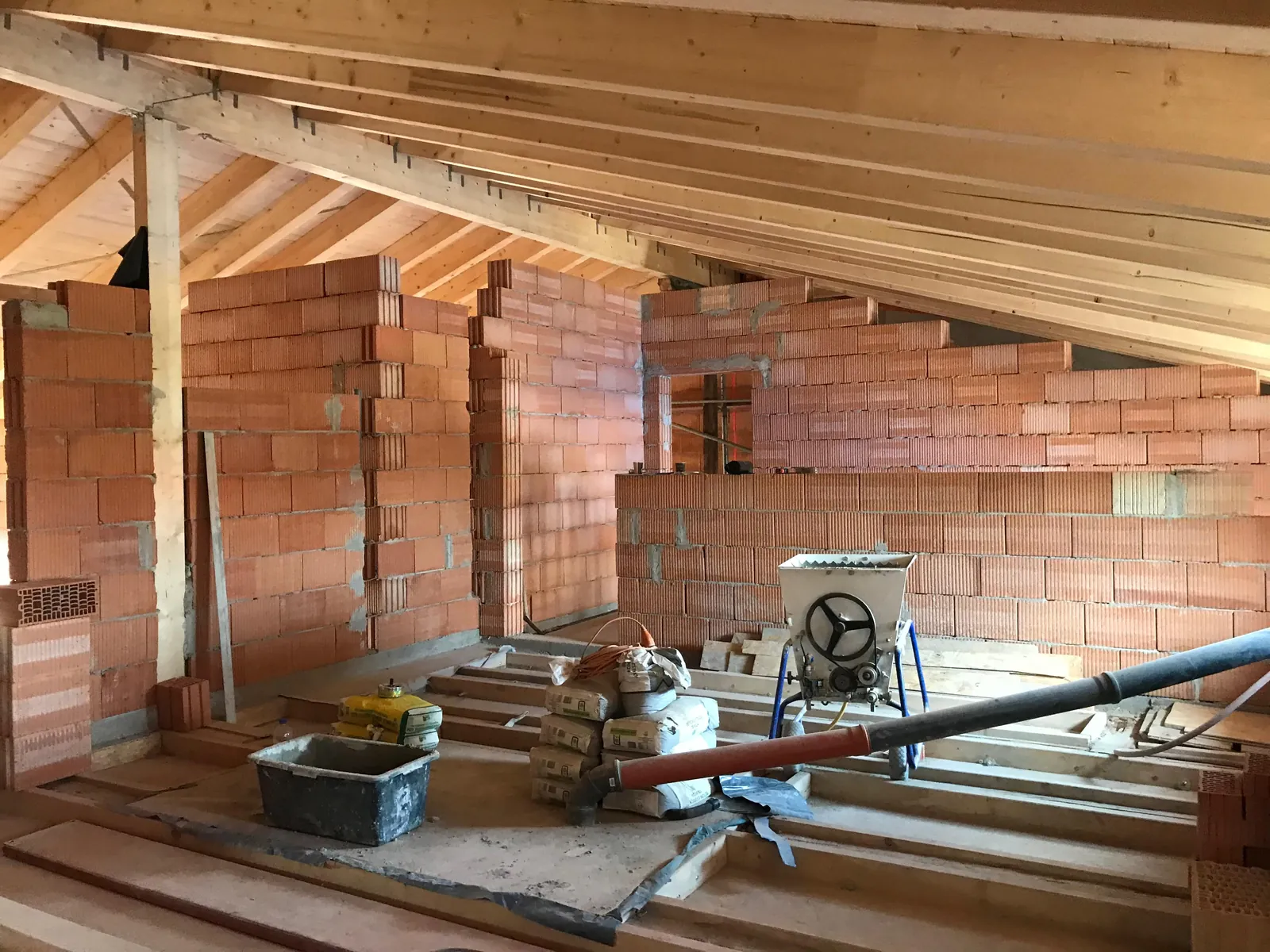 Attic conversion with new timber structure and masonry