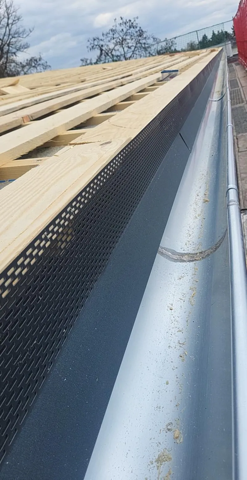 New gutter with leaf guard