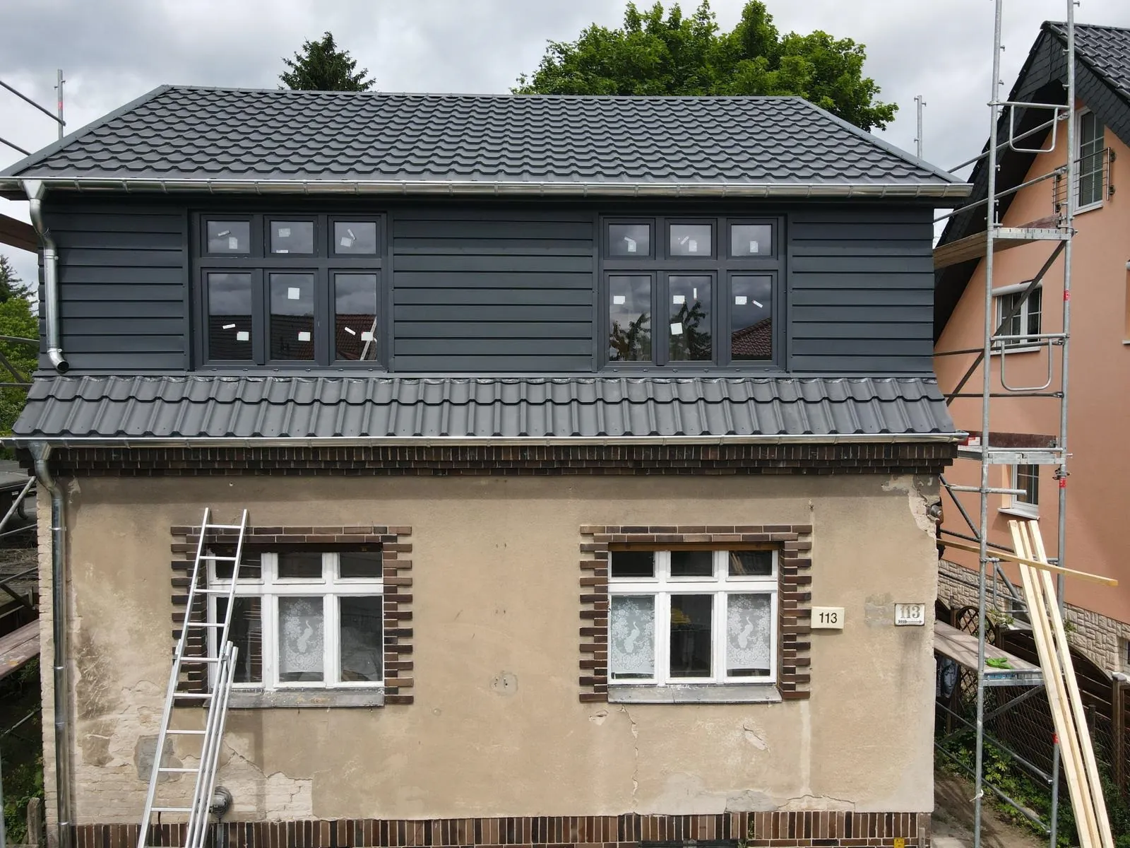 House with new gutters and downpipes