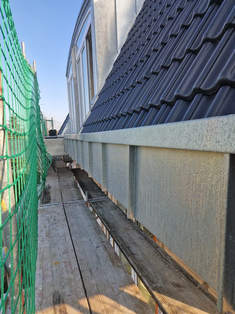 New sheet metal parapet cladding