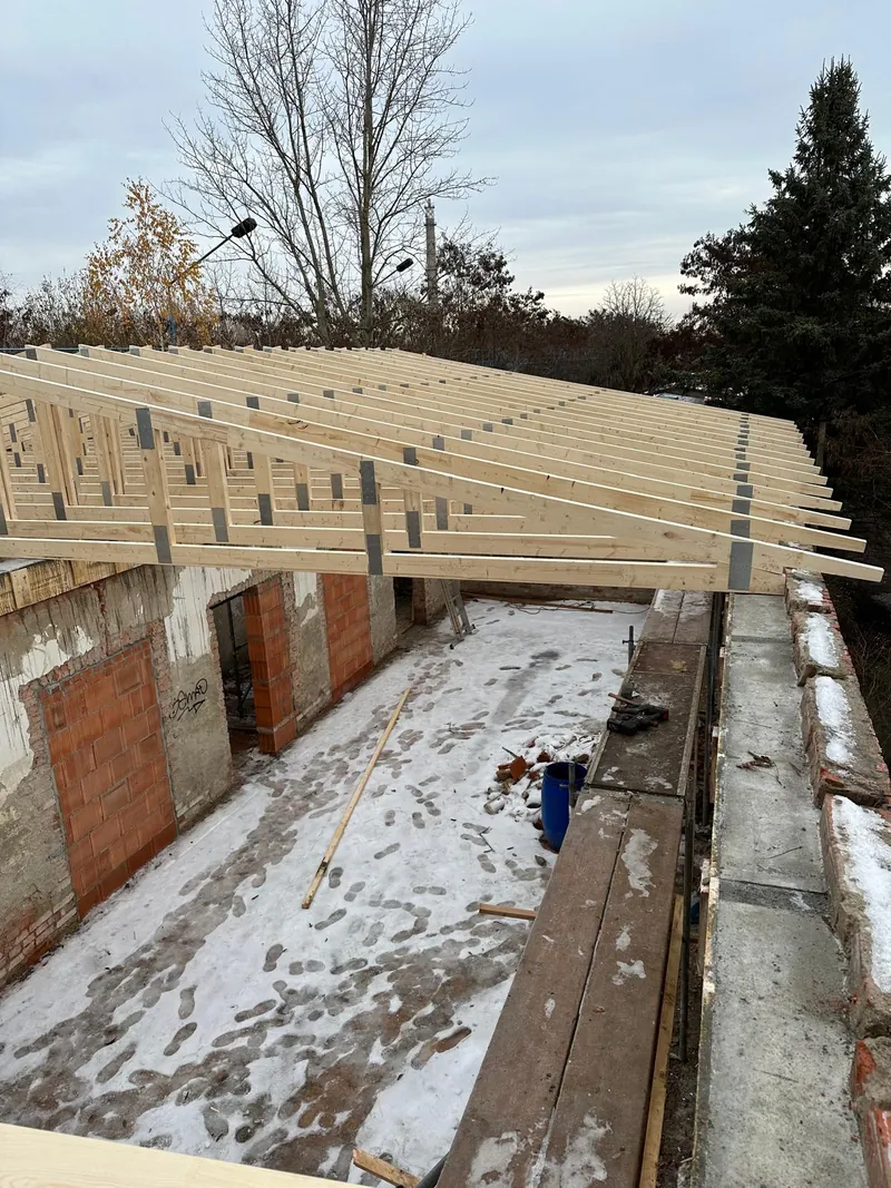 Timber joists on an old building in winter