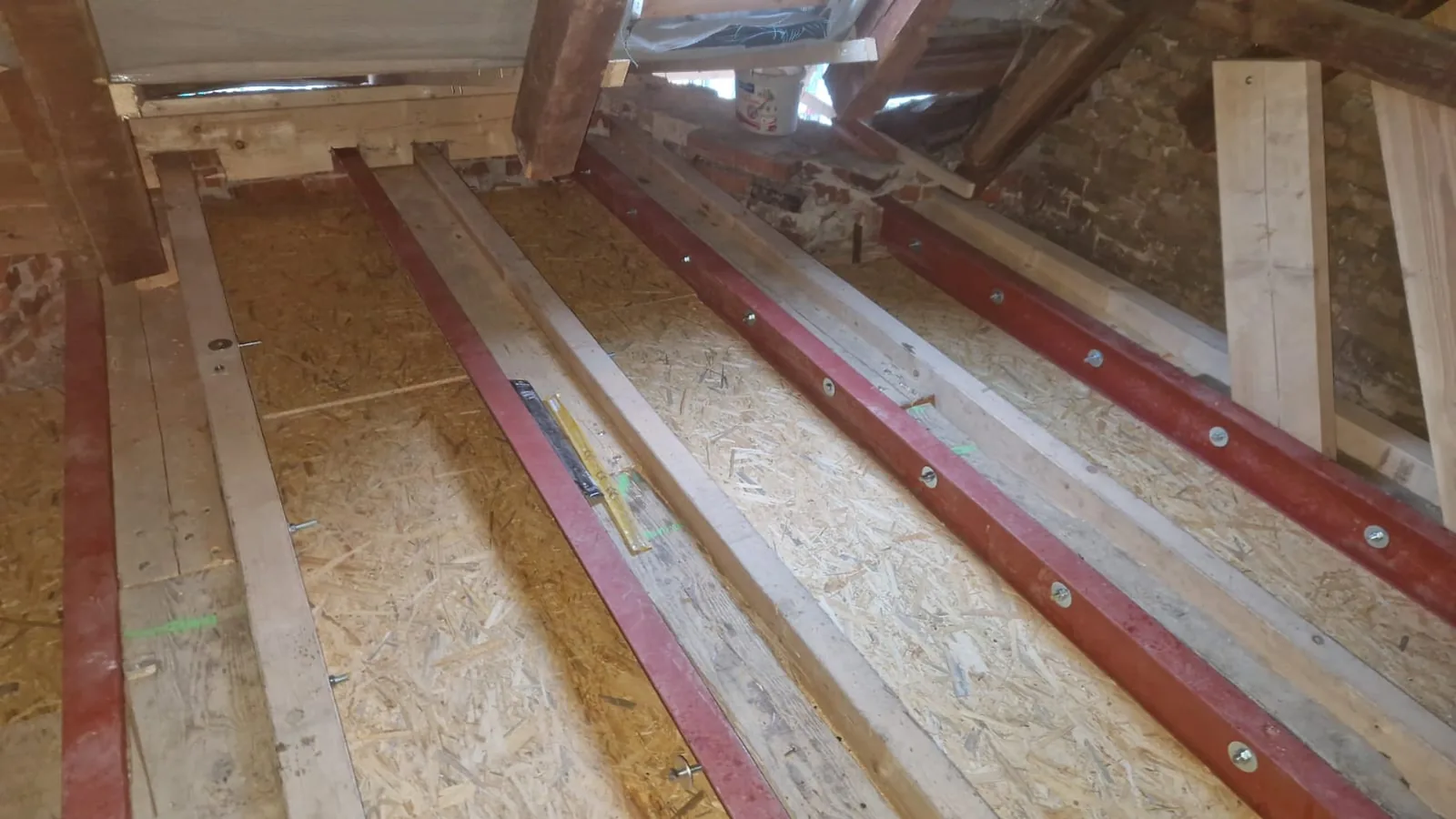 Timber joist floor renovation: joists reinforced with steel sections