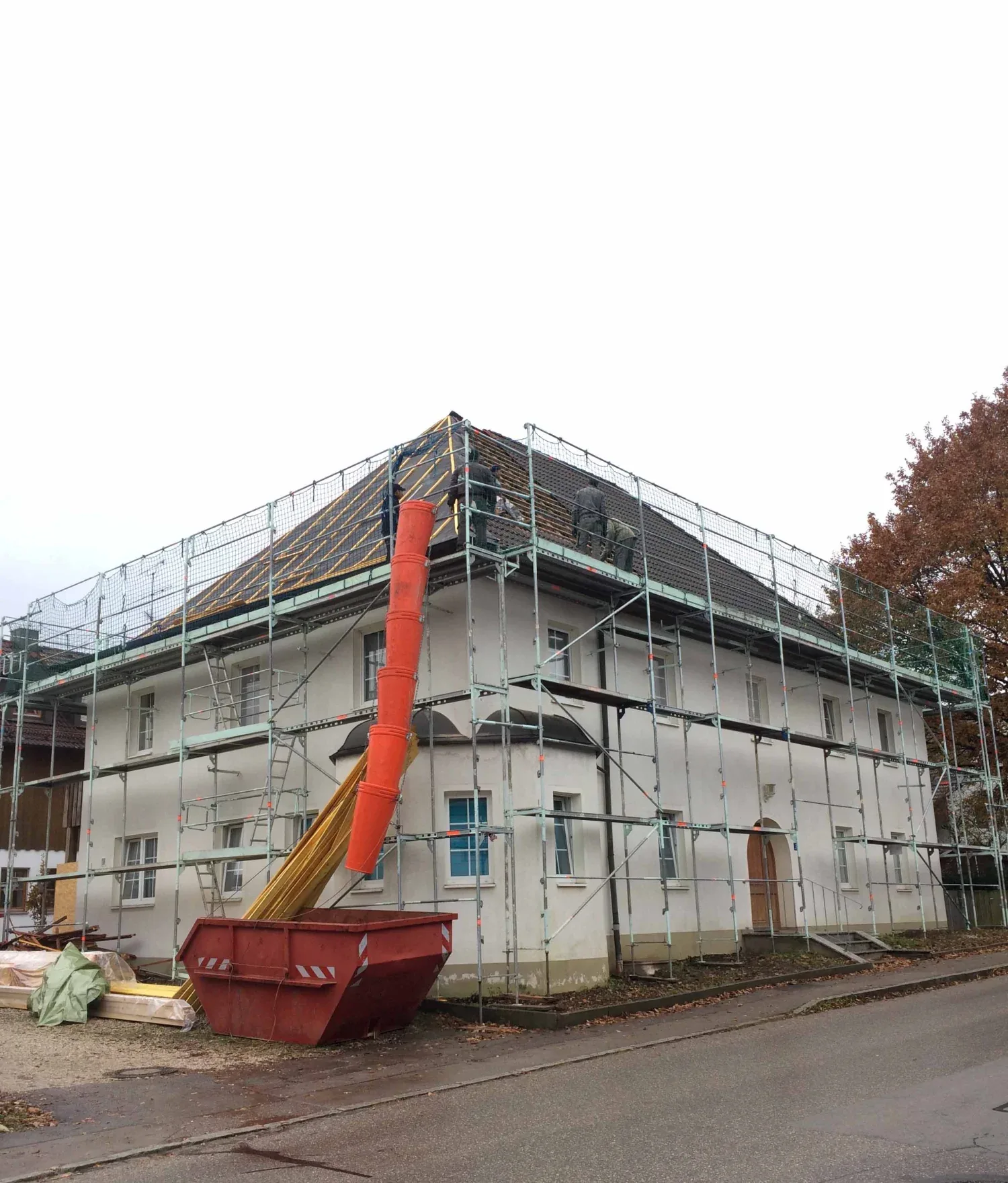 Before: scaffolded building during the renovation